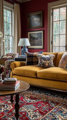 a living room filled with furniture and lots of windows