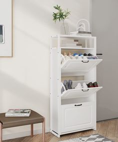 a white shoe rack with shoes on it