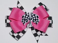 "This racing flag hair bow measures 3.5\". The theme of this bow features a top 3\" bow in hot pink. The bottom 3.5\" pinwheel bow is black and white checks. It is topped with a cute matching bow center. You can choose to leave off this bow center if you prefer. The solid bow color can be changed to any color you like. Just choose the color you want from the drop down box. There is a color chart in the photos so you can see the colors available and what they look like. If you want the bow as sho Baby Birthday Party Theme, Racing Flag, Baby Birthday Themes, Second Birthday Ideas, Race Car Birthday Party, Cars Theme Birthday Party, Pinwheel Bow, Race Car Birthday