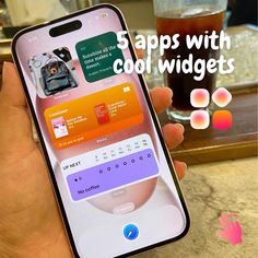 someone is holding up their cell phone with the text 5 apps with cool widgets