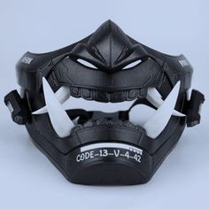 This cyberpunk LED oni mask has been handcrafted meticulously by our skilled artisans, using the latest 3D printer technology. Details: We have padded the inside of the mask for your facial comfort. The mask can stay on your face for a long time in the activity you use. It does not cause pain on your face and you can breathe comfortably. It is very robust in your activities with its high filling and extra layer thickness. You can adjust it according to your face with its adjustable straps. If yo Black Mask For Halloween Protection, Black Protective Mask For Halloween, Modern Black Masks And Prosthetics For Masquerade, Modern Black Masquerade Masks And Prosthetics, Futuristic Black Masks For Halloween, Black Halloween Mask For Protection, Cyberpunk Black Mask For Masquerade, Black Cyberpunk Mask For Masquerade, Cyberpunk Masks For Halloween Protection