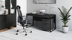 an office with a desk, chair and bookshelf in the corner next to a potted plant