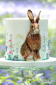 there is a cake decorated with a rabbit on it