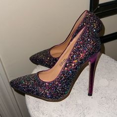 Purple Heels Size 5.5 Glitter Never Worn Multicolor Heels With 4-inch Heel For Night Out, Multicolor Pointed Toe Heels For Night Out, Glitter Print Heels For Party Season, Glamorous Purple Party Heels, Multicolor 4-inch Heels For Night Out, Multicolor 4-inch Heels For Party, Shimmer Pointed Toe Heels For Night Out, Shimmer Pointed Toe Heels For Party Season, Chic Shimmer Heels With Pointed Toe For Party Season