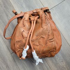 Frye Vivian Leather Bucket Bag. Excellent New Condition. Laser Cut Soft Buttery Leather Bag Made In The Frye Tradition Of Quality. New With Factory Protective Tissues In Place. Approximate Measurements 12"H X 12"W X 6"D Large Leather Crossbody Bag, Frye Handbags, Frye Bags, Leather Hobo Handbags, Drawstring Bucket Bag, Leather Saddle Bags, Black Leather Purse, Leather Bucket Bag, Leather Bucket