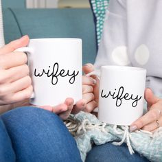 two women holding coffee mugs with the words wifey and wifey written on them