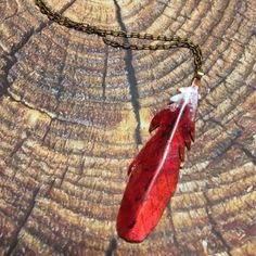 Hand-fabricated bronze cardinal feathers with layers of vivid layers of red and white. Feathers hang from drawn antiqued brass-finish cable chain with "S" hook closure. Size: 3" x 3/4" *Earrings sold separately. Bronze earrings shown for metal color option. Red Feather meaning: the root chakra money, possessions security, stability career good fortune physical vitality, energy, life force ​strength, courage passion, emotions courage Cardinal: Cardinals in nature mate for life. They’re also homeb Cardinal Feathers, Cardinal Feather, Persona Oc, Mha Hawks, Feather Meaning, Mha Art, Hunter Toh, 4 Earrings, Crochet Case