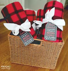 red and black plaid towels in a wicker basket with chalkboard tags on them