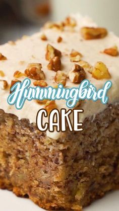 a close up of a piece of cake on a plate with the words hummingbird cake