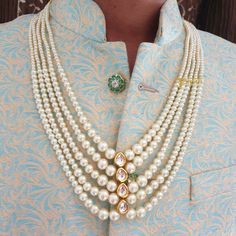 Pearl Necklace For Groom, Sherwani Necklace, Kundan Pearl Necklace, Long Necklace For Groom, Indian Wedding Jewellery, Pakistani Groom Mala 5 Layered Kundan Pearl Beads Necklace An elegant Kundan pearl beads necklace with the most stunning festoon. The perfect accessory for your occasion. This necklace is handcrafted with love Necklace Length: 24 inches Package: 1 Necklace Material: Premium Pearl beads, Brass, Kundan Design: Choose from the drop-down menu Care: Store in an airtight plastic bag or box. Keep away from water, moist place & fragrance For Express shipping, the option is available in the drop-down menu at checkout. If you need any help regarding placing an order or express shipping, feel free to message us DISCLAIMER: This product is made to order. Product color may slightly var Pakistani Necklace, Indian Wedding Jewellery, Trendy Fashion Jewelry, Bollywood Jewelry, Indian Wedding Jewelry, Kundan Necklaces