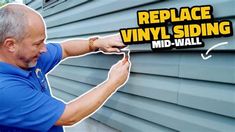 a man painting the side of a house with vinyl siding and advertisming