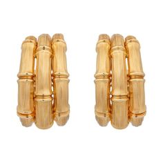 Cartier A Fine Pair of Yellow Gold Hoop Ear Clips | From a unique collection of vintage clip-on earrings at https://www.1stdibs.com/jewelry/earrings/clip-on-earrings/ Exquisite Gold Clip-on Earrings, Luxury Yellow Gold Clip-on Earrings, Luxury 14k Yellow Gold Clip-on Earrings, 90s Bamboo Earrings, Real Gold Bamboo Earrings, Gold Bamboo Earrings, Bamboo Jewelry, Cartier Earrings, Bamboo Hoop Earrings