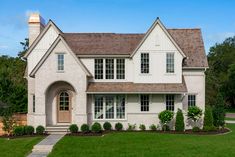 a large white house with lots of windows