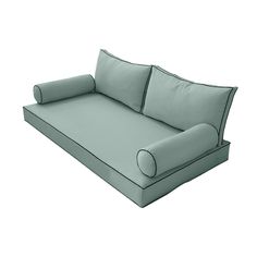 an image of a couch with pillows on it