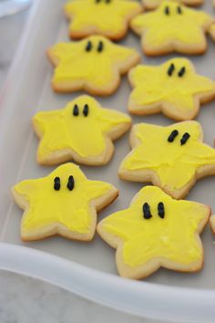 decorated cookies in the shape of stars on a tray