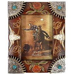 a cowboy riding a horse in an ornate frame