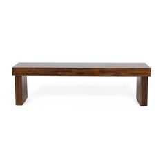 a wooden bench sitting on top of a white floor