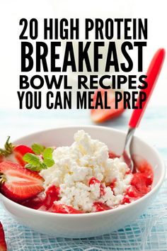 a white bowl filled with strawberries and cottage cheese on top of a blue table