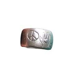 Jes Maharry Ahisma Ring Featuring Hand With Piffy Heart, Butterlfy, Flower, Eye, Peace Sign, Love. Inscription Reads Ahisma And Is Signed Jes. Jes Maharry Jewelry, Hand Flower, Hand Flowers, Love Peace, Peace Sign, Peace And Love, Silver Ring, Silver Rings, Ring