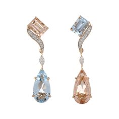 Elegant and Exquisitely detailed Dangling Gold Earrings, set with 3.40 Ct (total ) Aquamarine, 3.07 Cts (total) Morganite, accented with Marquise and Round Diamonds, weighing approx. 0.20 Cts. total carat weight. Beautifully Hand crafted in 18 Karat Rose Gold. Stone Size: Morganite: 14x7 mm (Octagon), 7x5 mm (Pear) Aquamarine: 14x7 mm (Octagon), 7x5 mm (Pear) Gemstone Carat Weight: Morganite: 3.07 Cts. (Total) Aquamarine: 3.40 Cts. (Total) Diamonds: GH-SI Approx. Wt.: 0.20 Cts. Luxury Multi-stone Diamond Earrings For Formal Occasions, Luxury Multi-stone Earrings For Formal Occasions, Formal Multi-stone Diamond Earrings, Luxury Pear-shaped Diamond Earrings With Gemstones, Luxury Multi-stone Diamond Earrings For Anniversary, Multi-stone White Gold Earrings For Formal Occasions, Formal Multi-stone Fine Jewelry Earrings, Elegant Multi-stone Diamond Earrings For Anniversary, Elegant Multi-stone Diamond Earrings For Formal Occasions