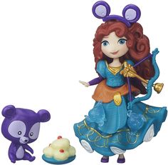 disney princess figurine with toy bear and cake