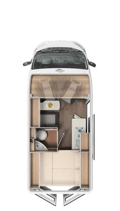 the interior of a small motor home with its doors open and shelves on each side