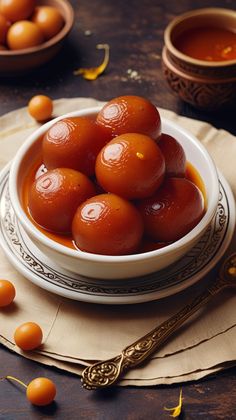 a white bowl filled with tomatoes on top of a table