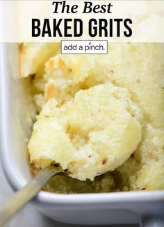 the best baked grits recipe in a white dish with a spoon and text overlay that reads,'the best baked grits add a pinch