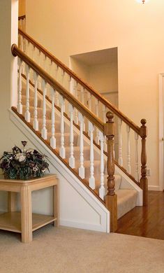 the stairs in this house are made of wood