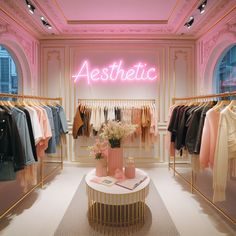 a clothing store with pink lighting and clothes on racks