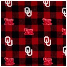 a red and black checkered fabric with the university of south carolina on it