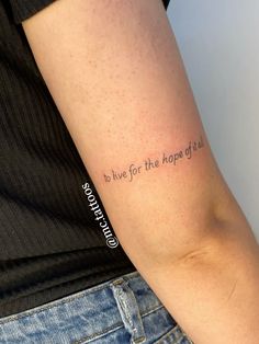 a woman's arm with the words to live for the hope of truth on it