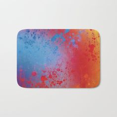 an abstract painting with blue, red and yellow colors on it bath mat by artfuldesign