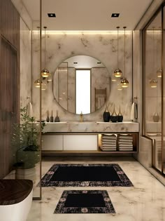 a bathroom with marble walls and flooring is shown in this image, there are lights hanging from the ceiling