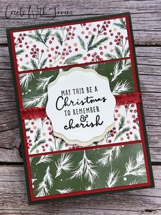 a christmas card with holly and berries on it, the words may this be a christmas to remember each other