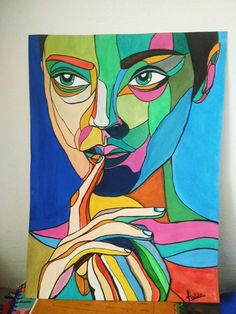 a painting of a woman's face with colorful lines on her body and hands