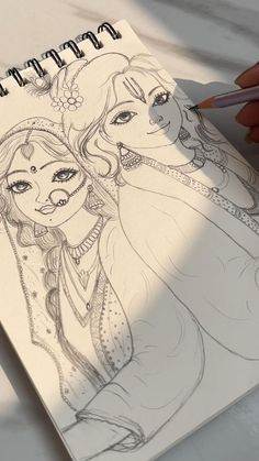 a drawing of two women with long hair and one is holding a pencil in her hand