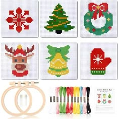 cross - stitch christmas cards are shown with scissors and other crafting supplies for the holiday season