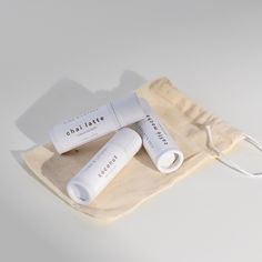 "This Natural Lip Balm Set includes three 0.30 oz flavoured lip balms (twice the size of standard lip balm tubes) and comes wrapped in a muslin cotton bag. ✧ COCONUT ✧ CHAI TEA  ✧ COFFEE All of our balms are handcrafted in small batches with premium natural + organic ingredients like cocoa butter, jojoba oil and pure Canadian Beeswax. No hard or waxy product here.. these buttery balms glide on like silk.. hydrating and leaving your lips feeling luxuriously smooth.  Free from artificial colorants or synthetic fragrances.  The paperboard packaging is biodegradable + recyclable. DETAILS:  [Flavour Oils -- Our Natural & Organic Flavour Oils are created and produced with all-natural and organic plant based materials. They are gluten-free, do not include meat, seafood, poultry, eggs or dairy pro Jumbo Lip Balm, Caffe Mocha, Coconut Lip Balm, Lip Balm Gift, Lip Balm Set, Lip Balm Tubes, Flavored Lip Balm, Flavored Oils, Natural Lip Balm