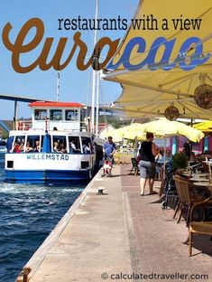 people are sitting at tables near the water with boats in the background and an advertisement that reads restaurants with a view europe