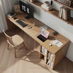 a computer desk with books and other items on it in front of a book shelf