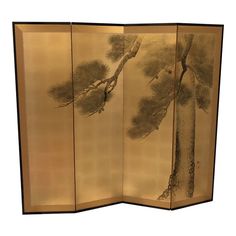 four panel screen with trees and birds on it, in gold foiled finish to each panel