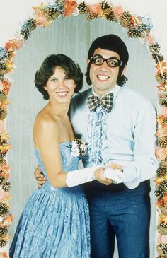 "My best theme party was called The Prom From Hell. I had the girls dress up in the worst bridesmaid gowns they've ever worn, and then we danced to the cheesiest music — Peter Cetera, Richard Marx, and Phil Collins." - Redbook.com Theme Party Ideas For Adults Dress Up, Prom Photos Couple, Funny Party Themes, 80s Couple Costume, 70s Prom, Prom Outfits For Guys, School Prom, 80s Prom, Prom Queens