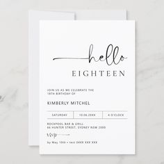 a white card with the word hello written in black ink, on top of a marble surface