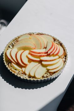 an apple pie is sitting on a table