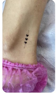 small black hearts tattoo on the ankle