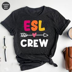 "ESL teacher shirt, English second language, ESL Crew tee, Elementary Teacher Shirt, ESOL Teacher Shirt, School Shirts, Gift For English Teacher * Unisex T Shirt: \"Bella Canvas\" - Retail fit, Runs true to size. - Solid colors: 100% Ring-Spun soft cotton. Heather colors: 52% Ring-Spun cotton 48% polyester. * V-Neck T Shirt: \"Bella Canvas\" - Retail fit, Runs true to size. - Solid colors: 100% Ring-Spun soft cotton. * Women's T Shirt: \"Anvil\"  Feminine cut, Runs smaller than usual (Please use Esol Teacher, Asl Interpreter, English Teacher Gifts, Esl Teachers, Esl Teaching, Second Language, Elementary Teacher, English Teacher, Teacher Tshirts