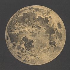 an old photo of the moon taken in black and white with gold foil on it