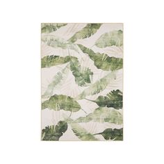 a green and white rug with leaves printed on it's sides, in front of a white background