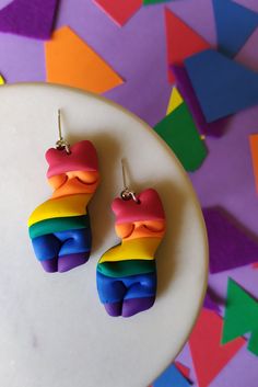 Pride Collection: Love is love and that's what we are celebrating!  The earrings are super lightweight, every pair is handmade, made from small slabs so that attention is paid to every detail. Due to the handmade nature of the earrings, some pairs may slightly vary from the picture and also the color may slightly look different than the picture.  The earrings are very lightweight, they weight less than 15 gr each. CARE ----------------------------------------------------------------------------- Lgbtq Clay Art, Rainbow Polymer Clay Jewelry For Gifts, Polymer Clay Earrings Rainbow, Polymer Clay Pride Earrings, Pansexual Earrings, Carton Box, Objet D'art, Pride Flags, Diy Clay